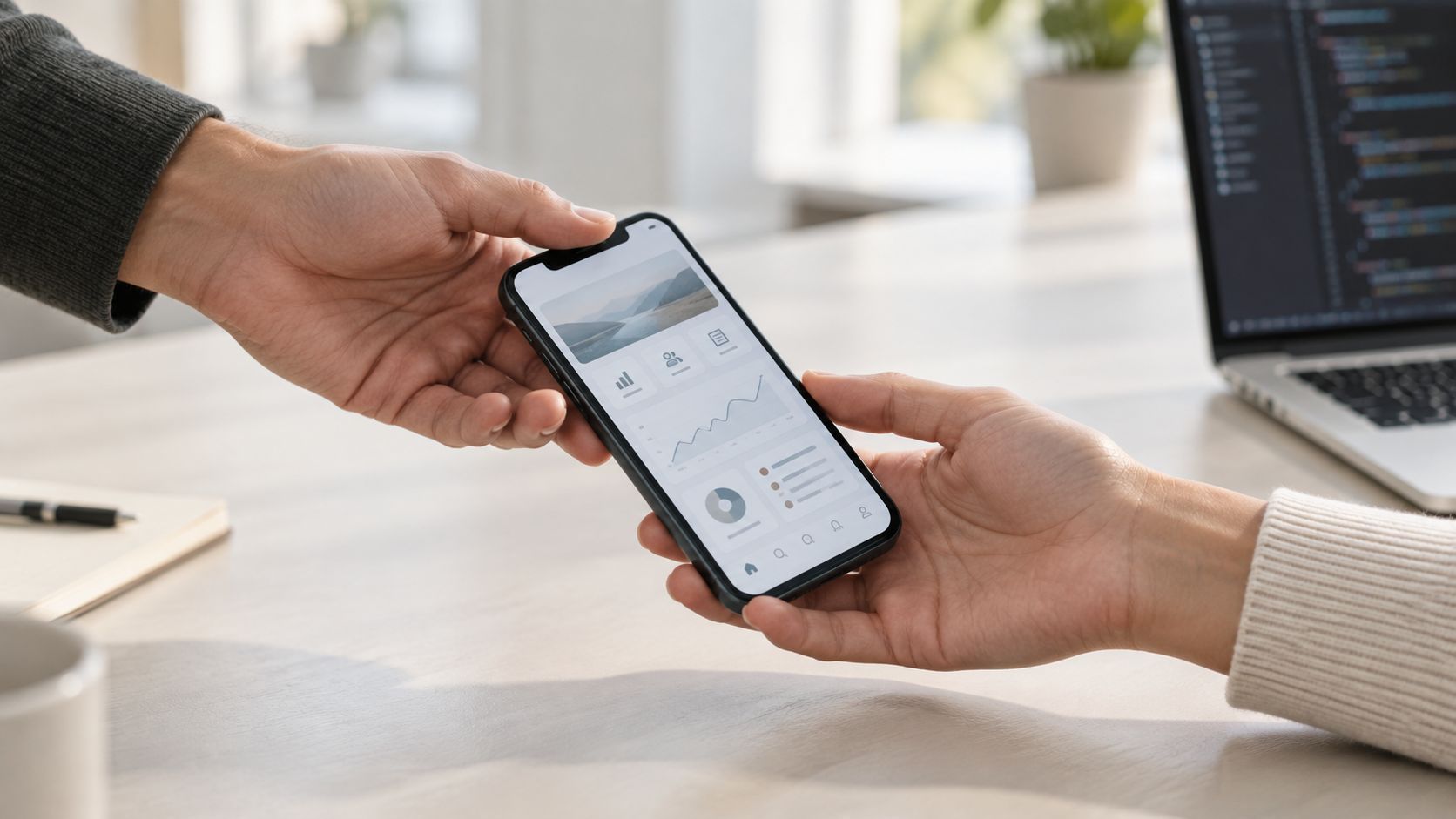 two hands, a mobile phone, mobile app take over process